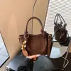 Bolso de hombro casual de nicho simple y elegante transfronterizo, nuevo bolso de mano popular estilo coreano otoño 2026, bolso de moda