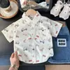 Ropa Infantil de Nuevo Estilo Verano 2026 para Niños, Camisas de Algodón con Estampado de Dibujos Animados de Manga Corta, Venta al por Mayor y Dropshipping