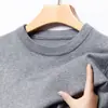 Camisa base de tricô lisa para homens, suéter interno slim-fit para outono e inverno, suéter masculino de gola redonda, novo estilo moderno para outono e inverno 2026
