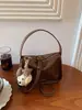 Bolsa de Mão Feminina Couro Macio Retrô de Nicho 2025 Nova Versátil Ombro Único Transversal Corrente Bolsa Fashionável Sensação de Alto Padrão Bolsa Almofada