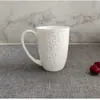 Fabricante de Tangshan Exporta Taza de Cerámica Grabada Exportación de Comercio Exterior Taza Blanca Pura Café Leche Taza de Porcelana de Hueso de Alto Valor