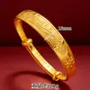Pulsera estilo antiguo chapada en oro con el carácter "Fu" y motivos de dragón y fénix, pulsera Ruyi de imitación oro para mujer, brazalete moderno push-pull de 12 mm al por mayor
