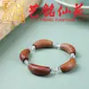 Pulsera de madera de manzano y anacardo, estilo pareja Art Ming Xianyuan, pulsera creativa y única de tubo curvo de madera de una sola hebra