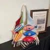 Bolsa de Tricô Patchwork Versátil Estilo Retro de Nicho Transfronteiriça com Franjas Nova Coleção Primavera 2026 Bolsa de Ombro Color-Blocking Bolsa Tote
