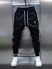 Calça Jogger Masculina Nova e Moderna com Cordão na Cintura Elástica, Calça Esportiva Casual, Calça Versátil de Corte Slim