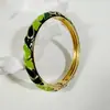 Yongge Jewelry Pulsera de Esmalte Transfronteriza Europea y Americana para Mujer Moderna Colorida Geométrica Rayada de Puntos Filigrana con Borde Dorado Accesorio de Mano