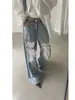 Calça pantalona cintura alta azul claro retro americana com retalhos de renda rasgada, barra desfiada, vazada, reta, comprimento no chão
