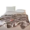 Manta dupla face nova A-grade Outono/Inverno 2026 com textura de cashmere sintético, um cobertor versátil para sofás, proporcionando calor