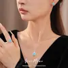 Juego de collar con colgante cuadrado de circón, aretes y anillo, joyería de lujo ligero, alta gama, elegante, diseño de nicho, venta al por mayor