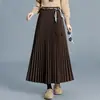 Saia plissada moderna e elegante para mulheres, novo estilo outono e inverno 2026, cintura alta, modeladora, comprimento médio, versátil e estilosa