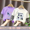 Camiseta de manga larga de algodón puro para niño, nuevo modelo primavera y otoño 2026, camiseta básica con estampado de dibujos animados para niño, top falso de dos piezas, moderno
