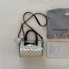 Bolsa Boston fofa estilo coreano com laço, bolsa de mão de bolinhas de nicho, moderna e na moda, bolsa de ombro fresca e doce