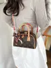 2026 Nuevo Bolso de Mano de Moda de Gama Alta Vintage para Mujer Estilo Boston Retro Europeo y Americano Bolso Versátil de Hombro Cruzado