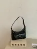 Bolso de Mano Versátil de Diseño de Nicho Francés Retro Simple Ins Bolso de Moda de Diseño Popular Bolso Dumpling de Hombro Único para Mujer