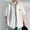 Camisa de trabajo de punto gofrado de verano para hombre, manga corta, corte holgado, marca de moda, elegante y fresca, chaqueta de manga media para hombre