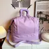 Bolso de mano de nailon texturizado de gran capacidad a la moda 2026 nuevo modelo color macarrón bolsa de almacenamiento expandible bolso cruzado