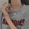 Collar de moda estilo hip hop para mujer, estilo frío, con diseño de nicho de circonita de color de alta calidad y cruz de acero de titanio dulce y fresco.