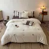 Estilo Romántico de Primavera Algodón de Fibra Larga Cepillado Juego de Cuatro Piezas Otoño/Invierno Todo Algodón Ropa de Cama Caliente Juego de Cama con Corazón de Niña Dormitorio