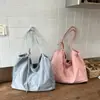 Bolsa tote de lona para mulheres, novo modelo 2026, grande capacidade, simples e casual, adequada para o trajeto diário, bolsa de ombro para o trabalho diário