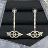 Aretes de Letra Doble C Estilo Chanel para Mujer, Aretes de Botón con Diseño de Nicho, Aretes de Lujo Ligero Inspirados en Chanel, Aguja de Plata