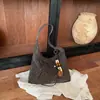 Lujo discreto de alta gama, bolso de axila de nicho para mujer, nueva colección de verano 2026, un bolso tote de hombro moderno y exquisito, perfecto para ir al trabajo