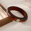 Pulsera de Flores de Madera Turquesa Transfronteriza Europea y Americana Simple y Atmosférica para Mujer Pulsera de Moda Retro de Lujo Ligero Joyería de Mano con Sensación de Alta Gama