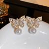 Pendientes de mariposa de cristal con aguja de plata S925 para mujer, explosivos, combinables, ligeros, de lujo, pequeños, estilo Chanel, a la moda, elegantes, colección de pendientes.