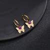 Pendientes con hebilla redonda de estilo francés, con forma de sol dorado de 14 quilates, estilo europeo y americano, de acero de titanio y combinables.