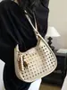 Moderna Bolso Cubo Grande Nuevo para Mujer 2026 Estilo Coreano Hueco Bolso de Hombro Único Versátil Bolso Cruzado para el Viaje Diario