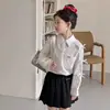 Conjunto Estilo Preppy para Niñas Falda Primavera y Otoño 2026 Nuevo Camisa Dulce con Lazo y Falda Plisada para Niños Mayores