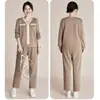 Madre de mediana edad 2026 Traje de ropa nuevo Primavera y Otoño Casual Deportivo Sudadera de mediana edad y personas mayores Conjunto de dos piezas estilo Primavera y Otoño para mujer