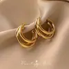 Aretes de Oro al por Mayor Transfronterizos para Mujer 2025 Nuevo Estilo Caliente Aretes Elegantes de Alta Gama Diseño Nicho Aretes de Metal