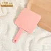 Espejo de mano y peine dos en uno, espejo de maquillaje portátil con peine, espejo de tocador de escritorio, espejo pequeño portátil con peine y mango