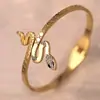 Pulseira de Trevo de Quatro Folhas Pulseira de Aço Inoxidável para Mulheres Pulseira de Aço Titânio Cor Dourada com Diamantes Estilo Preto e Branco Joias Que Não Desbotam Transfronteiriça