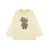 Conjunto de Primavera 2026 para Niñas Amybaby Nuevo Estilo Coreano Súper Lindo Top con Estampado de Oso y Falda Plisada