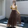 Elegante y delicado estilo falda de pastel plisada para mujer, nuevo modelo otoño e invierno 2026, con efecto adelgazante, línea A, dobladillo amplio, falda larga de malla