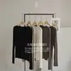 Colección de principios de otoño: Camiseta suave y cómoda para mujer hecha de Tencel y seda, con diseño sin dedos, mangas largas, cuello redondo y efecto adelgazante, perfecta como capa base