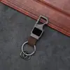 Llavero de cuero transfronterizo, abridor de botellas multifuncional, llavero creativo para coche para hombre, colgante de metal con letras láser