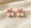 Brincos de tarracha rosa de alta qualidade para mulheres, simples, doces, joias de ouvido com temperamento requintado, fornecimento exclusivo transfronteiriço