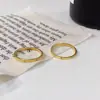 En 2025, el nuevo anillo de cola de un carácter dorado de moda tiembla pequeño libro rojo transfronterizo para fabricantes de origen