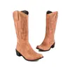 Botas de cuero de color liso con tacón cuadrado 35-48 otoño e invierno transfronterizas de tacón medio caña alta para mujer punta fina versátiles sin cordones botas estilo western
