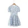 2026 Nuevo Vestido de Vacaciones Estilo Europeo y Americano Retro Francés Floral Cuello en V Ajustado Mangas Abullonadas