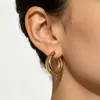 Brincos de Argola Dourados Mais Vendidos para Mulheres, Feitos de Liga de Ferro, Estilo Retro Francês Minimalista, Design de Nicho de Luxo Leve, Brincos Simples