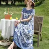 Elegante y moderno vestido de noche de algodón y seda de verano nuevo para madres de mediana edad y mayores, elegante vestido casual holgado para el hogar para mujer