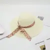 Nuevo sombrero de verano grande a lo largo sombrero de playa cinta tejido verano señoras mayores transpirable sombrero protector solar venta al por mayor