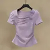 Diseño chic, camiseta de manga corta con hombros rectos para mujer, nueva moda de verano, casual, corte ajustado, top elegante y versátil