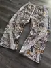 Pantalones Deportivos Casuales Americanos de Tres Rayas Cuidadosamente Seleccionados para Hombre en Diseño Otoñal Camuflaje de Hojas de Nicho Pantalones Cargo Funcionales