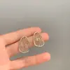 Pendientes de Estilo Nicho, Gama Alta, Estilo Genial, Pequeños, Sencillos, Modernos y Versátiles, Pendientes Huecos de Corazón
