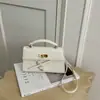 Nova Bolsa Kelly Padrão Lichia para Presente do Festival Qixi Alça de Gravata Borboleta Bolsa Quadrada Pequena de Mão Fivela de Fecho Ombro Único Transversal Bolsa Feminina