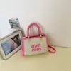 Bolsa Feminina de Designer de Nicho Mais Vendida na Primavera, Nova Moda Bolsa Transversal de Alto Padrão, Bolsa de Mão para o Trabalho, Bolsa Quadrada Pequena
